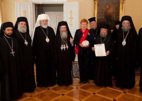 H.B. Theophilos and his escort in the meeting with President Halonen.