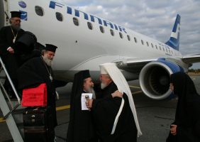 The reception for H.B from the Archbishop Leon at the airport.