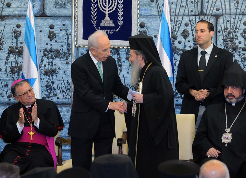 H. B. greeting His Excellency Mr. Peres the President of Israel.