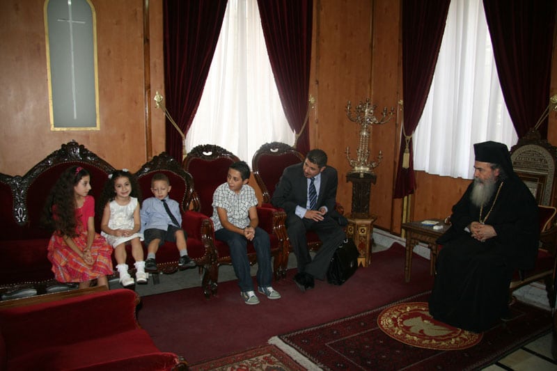 The Mougrabi family received by H. B. Patriarch of Jerusalem.