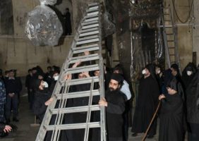 The Orthodox installing the ladder for sweeping