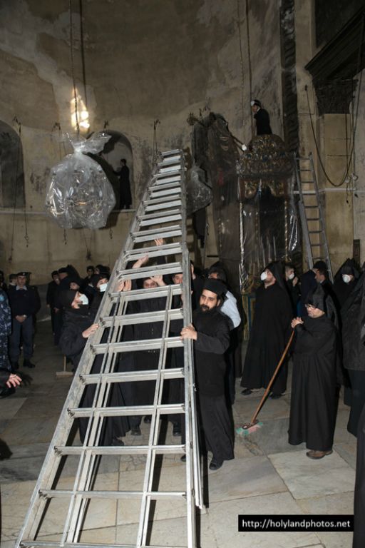 The Orthodox installing the ladder for sweeping