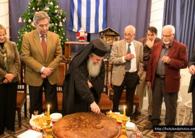 His Beatitude cuts St Basil’s pie at the Greek Club