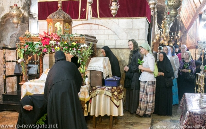 Pious pilgrims at the Bier of Theotokos
