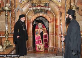 The Patriarch venerates at the Holy Sepulchre
